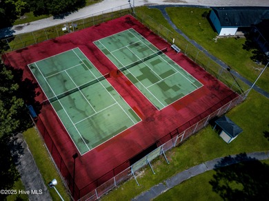 Beautiful Live Oak trees adorn this large corner lot in on Harbour Point Golf Club in North Carolina - for sale on GolfHomes.com, golf home, golf lot