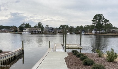 Beautiful Live Oak trees adorn this large corner lot in on Harbour Point Golf Club in North Carolina - for sale on GolfHomes.com, golf home, golf lot