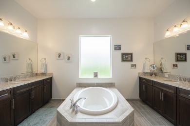 Live luxuriously & comfortably in this single-level Beaumont on Jupiter Country Club in Florida - for sale on GolfHomes.com, golf home, golf lot