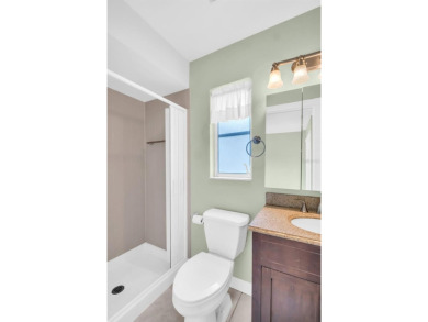 Beautifully updated and move-in ready, this 2-bedroom, 2-bath on Highland Lakes Executive Golf Course in Florida - for sale on GolfHomes.com, golf home, golf lot