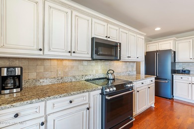 Custom-built home nestled on a quiet cul-de-sac in the highly on Ocean Ridge Plantation in North Carolina - for sale on GolfHomes.com, golf home, golf lot