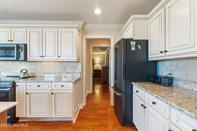 Custom-built home nestled on a quiet cul-de-sac in the highly on Ocean Ridge Plantation in North Carolina - for sale on GolfHomes.com, golf home, golf lot