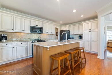 Custom-built home nestled on a quiet cul-de-sac in the highly on Ocean Ridge Plantation in North Carolina - for sale on GolfHomes.com, golf home, golf lot