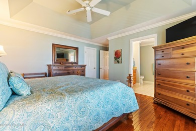 Custom-built home nestled on a quiet cul-de-sac in the highly on Ocean Ridge Plantation in North Carolina - for sale on GolfHomes.com, golf home, golf lot