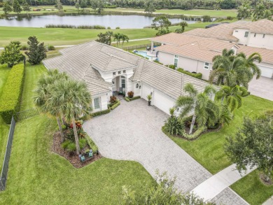 Live luxuriously & comfortably in this single-level Beaumont on Jupiter Country Club in Florida - for sale on GolfHomes.com, golf home, golf lot