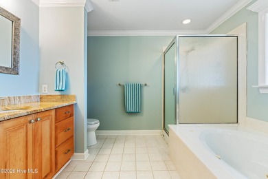 Custom-built home nestled on a quiet cul-de-sac in the highly on Ocean Ridge Plantation in North Carolina - for sale on GolfHomes.com, golf home, golf lot