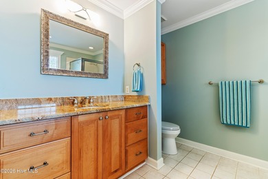 Custom-built home nestled on a quiet cul-de-sac in the highly on Ocean Ridge Plantation in North Carolina - for sale on GolfHomes.com, golf home, golf lot