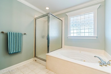 Custom-built home nestled on a quiet cul-de-sac in the highly on Ocean Ridge Plantation in North Carolina - for sale on GolfHomes.com, golf home, golf lot