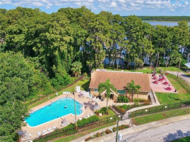 Beautifully updated and move-in ready, this 2-bedroom, 2-bath on Highland Lakes Executive Golf Course in Florida - for sale on GolfHomes.com, golf home, golf lot