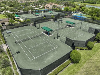 Live luxuriously & comfortably in this single-level Beaumont on Jupiter Country Club in Florida - for sale on GolfHomes.com, golf home, golf lot