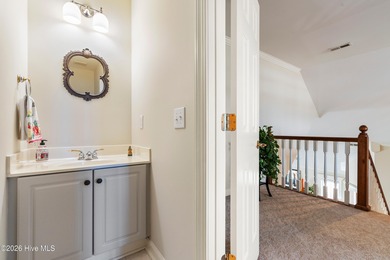 Custom-built home nestled on a quiet cul-de-sac in the highly on Ocean Ridge Plantation in North Carolina - for sale on GolfHomes.com, golf home, golf lot