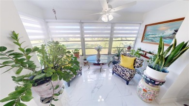 Click on virtual tour! This is a uniquely well done updated on Sunrise Lakes Phase III in Florida - for sale on GolfHomes.com, golf home, golf lot