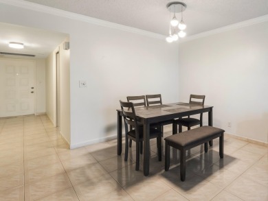 LIVE WHERE YOU PLAY~Beautiful 2/2 condo is your perfect retreat on Palm-Aire Country Club and Resort - The Oaks in Florida - for sale on GolfHomes.com, golf home, golf lot