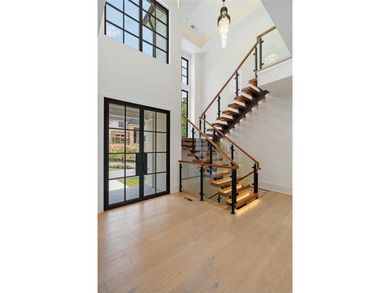 Welcome to a statement home in the prestigious Echelon community on Echelon Golf Club in Georgia - for sale on GolfHomes.com, golf home, golf lot