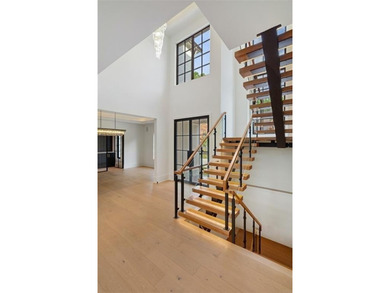 Welcome to a statement home in the prestigious Echelon community on Echelon Golf Club in Georgia - for sale on GolfHomes.com, golf home, golf lot