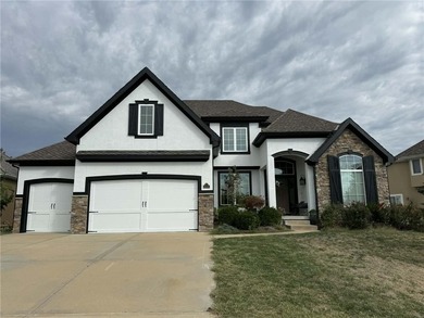 Welcome to an exceptional 1.5-story residence, perfectly on Tiffany Greens Golf Club in Missouri - for sale on GolfHomes.com, golf home, golf lot