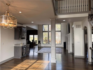 Welcome to an exceptional 1.5-story residence, perfectly on Tiffany Greens Golf Club in Missouri - for sale on GolfHomes.com, golf home, golf lot