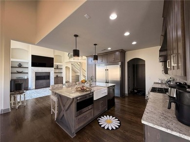 Welcome to an exceptional 1.5-story residence, perfectly on Tiffany Greens Golf Club in Missouri - for sale on GolfHomes.com, golf home, golf lot