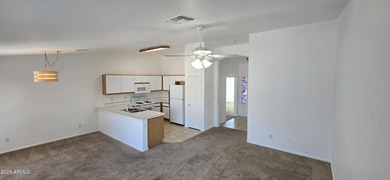 Welcome to this charming, move-in-ready corner-lot home on Springfield Golf Resort in Arizona - for sale on GolfHomes.com, golf home, golf lot