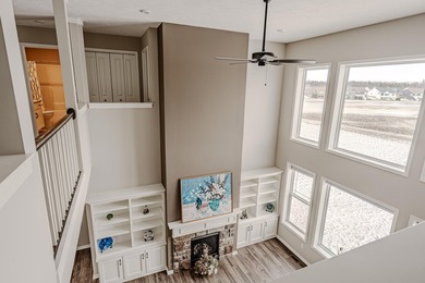 Wake up to peaceful golf course views ! You don't see homes like on The Macatwa Legends Golf Course in Michigan - for sale on GolfHomes.com, golf home, golf lot