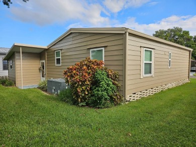 YOUR FLORIDA DREAM HOME is move-in ready! This METICULOUSLY on Grasslands Golf and Country Club in Florida - for sale on GolfHomes.com, golf home, golf lot