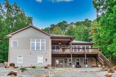 Your perfect second home awaits in Hot Springs Village! This on Cortez Golf Course in Arkansas - for sale on GolfHomes.com, golf home, golf lot