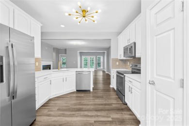 Experience refined living in this beautifully updated, move-in on Skybrook Golf Club in North Carolina - for sale on GolfHomes.com, golf home, golf lot