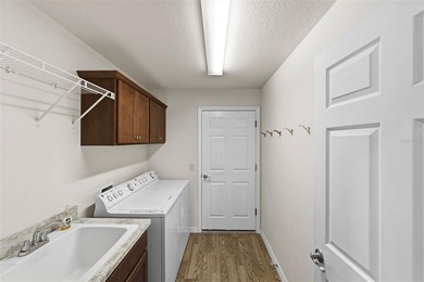 Beautifully positioned in the sought-after Village of Pine Hills on Pennbrooke Fairways in Florida - for sale on GolfHomes.com, golf home, golf lot