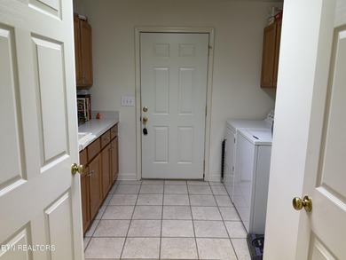 There are homes and then there are locations! This home is on Toqua Golf Course - Loudon County in Tennessee - for sale on GolfHomes.com, golf home, golf lot