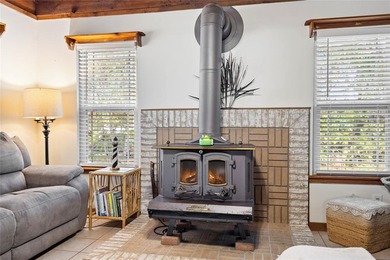 Charming 3 bedroom, 2 bath cedar sided, cul-de-sac home located on Holly Lake Ranch Golf Club in Texas - for sale on GolfHomes.com, golf home, golf lot