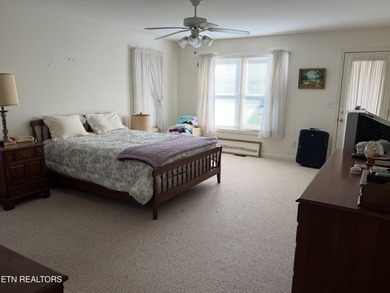 There are homes and then there are locations! This home is on Toqua Golf Course - Loudon County in Tennessee - for sale on GolfHomes.com, golf home, golf lot