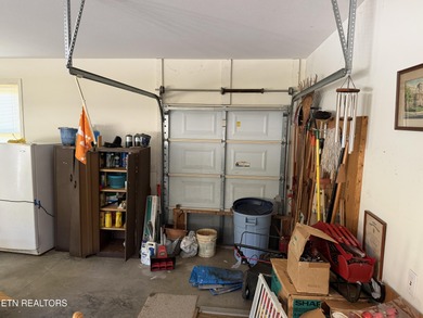 There are homes and then there are locations! This home is on Toqua Golf Course - Loudon County in Tennessee - for sale on GolfHomes.com, golf home, golf lot