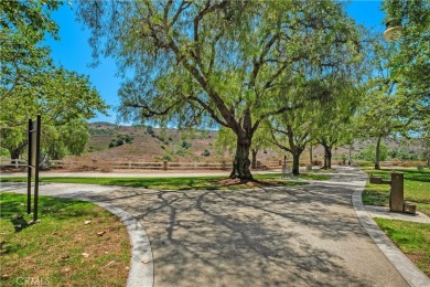 Welcome to this charming 2-bedroom, 2-bathroom end-unit condo on Tijeras Creek Golf Club in California - for sale on GolfHomes.com, golf home, golf lot