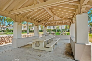 Welcome to this charming 2-bedroom, 2-bathroom end-unit condo on Tijeras Creek Golf Club in California - for sale on GolfHomes.com, golf home, golf lot