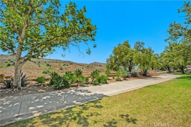 Welcome to this charming 2-bedroom, 2-bathroom end-unit condo on Tijeras Creek Golf Club in California - for sale on GolfHomes.com, golf home, golf lot