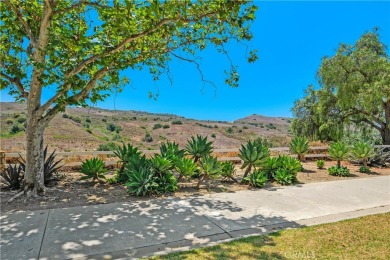 Welcome to this charming 2-bedroom, 2-bathroom end-unit condo on Tijeras Creek Golf Club in California - for sale on GolfHomes.com, golf home, golf lot