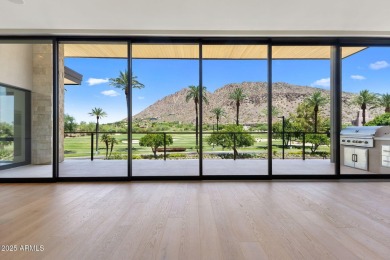 Experience the epitome of elegance and modern living in this on The Phoenician  in Arizona - for sale on GolfHomes.com, golf home, golf lot