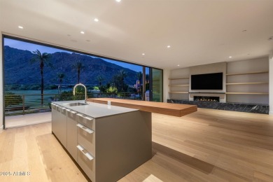 Experience the epitome of elegance and modern living in this on The Phoenician  in Arizona - for sale on GolfHomes.com, golf home, golf lot