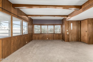 Charming home with great spaces and open layout! Large garage on Fountain of the Sun Country Club in Arizona - for sale on GolfHomes.com, golf home, golf lot