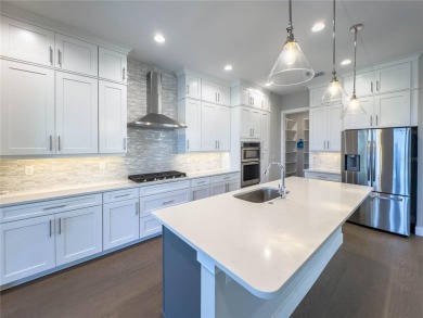This 2021 home is available today for sale in the Famous Bella on Bella Collina Golf Club in Florida - for sale on GolfHomes.com, golf home, golf lot