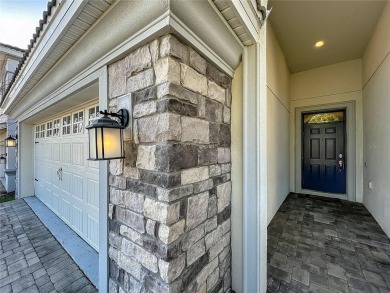 WALKING DISTANCE TO THE CLUBHOUSE. This beautifully designed on The Oasis Club at Champions Gate in Florida - for sale on GolfHomes.com, golf home, golf lot