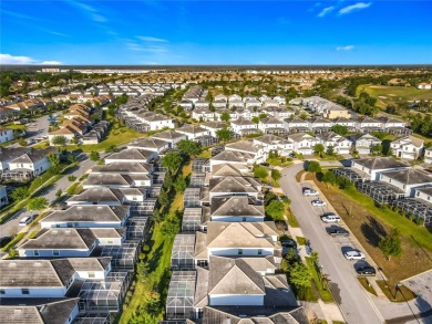 WALKING DISTANCE TO THE CLUBHOUSE. This beautifully designed on The Oasis Club at Champions Gate in Florida - for sale on GolfHomes.com, golf home, golf lot