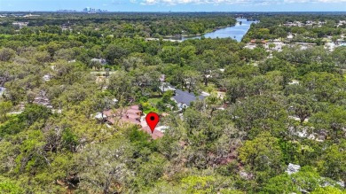 Come see this well-maintained 3-bedroom, 2.5-bath midcentury on Temple Terrace Golf and Country Club in Florida - for sale on GolfHomes.com, golf home, golf lot