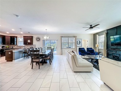 WALKING DISTANCE TO THE CLUBHOUSE. This beautifully designed on The Oasis Club at Champions Gate in Florida - for sale on GolfHomes.com, golf home, golf lot
