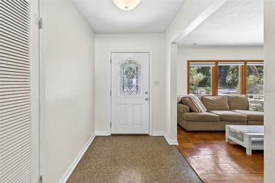 Come see this well-maintained 3-bedroom, 2.5-bath midcentury on Temple Terrace Golf and Country Club in Florida - for sale on GolfHomes.com, golf home, golf lot