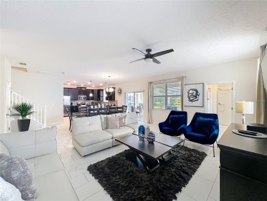 WALKING DISTANCE TO THE CLUBHOUSE. This beautifully designed on The Oasis Club at Champions Gate in Florida - for sale on GolfHomes.com, golf home, golf lot