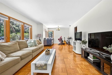Come see this well-maintained 3-bedroom, 2.5-bath midcentury on Temple Terrace Golf and Country Club in Florida - for sale on GolfHomes.com, golf home, golf lot