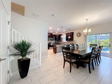 WALKING DISTANCE TO THE CLUBHOUSE. This beautifully designed on The Oasis Club at Champions Gate in Florida - for sale on GolfHomes.com, golf home, golf lot
