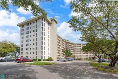 Enjoy a Serene Lake View from this Super Clean, Bright 2nd Floor on Palm-Aire Country Club and Resort - Palms in Florida - for sale on GolfHomes.com, golf home, golf lot