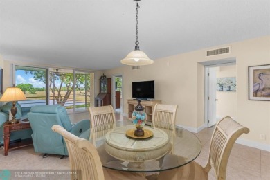 Enjoy a Serene Lake View from this Super Clean, Bright 2nd Floor on Palm-Aire Country Club and Resort - Palms in Florida - for sale on GolfHomes.com, golf home, golf lot